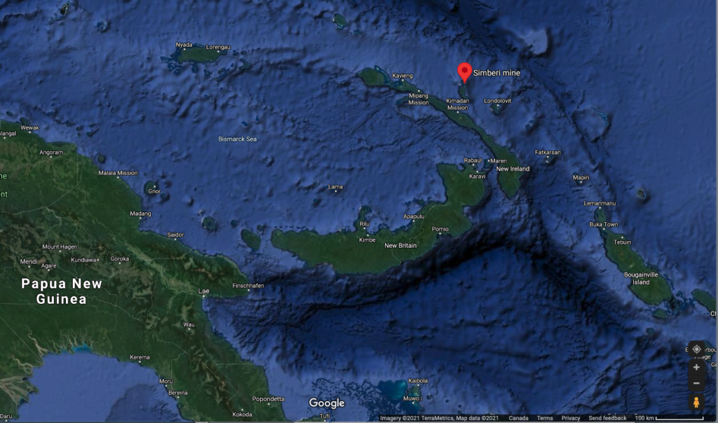 谷歌地图图像显示巴布亚新几内亚的圣巴巴拉Simberi矿的红色标记。岛屿是靠深蓝色的海洋的深绿色。
