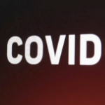 “COVID”在深红黑相间的背景上用白色大写字母书写