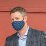 A close-up of Iain Rankin's face as he casts his ballot.