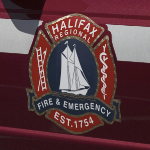 The Halifax Regional Fire and Emergency crest on the side of a vehicle.