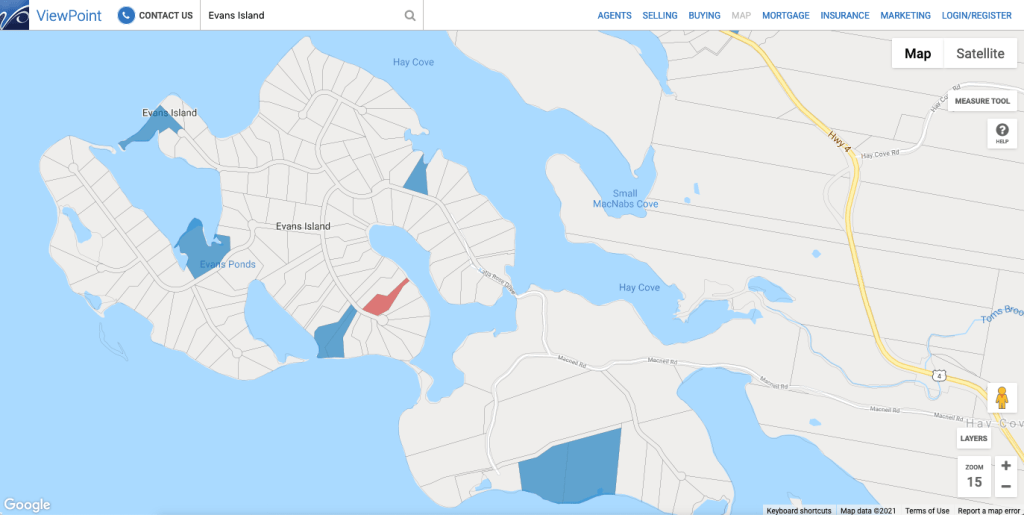 埃文斯岛的NS地图。在地图上，海水是蓝色的，岛屿的地图被分成了许多块。大部分地段都是白色的，就像地图上的其他地方一样。但有些地段是蓝色的，还有一块是红色的。