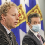 艾伦·麦克马斯特和瑞恩·格兰特在新闻发布会上