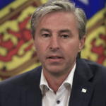 Premier Tim Houston at a press conference