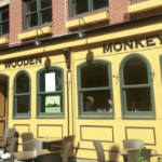 the outside of the Wooden Monkey, in bright sunlight
