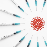 Vaccination needles arrange in a starburst around an illustration of the Coronavirus