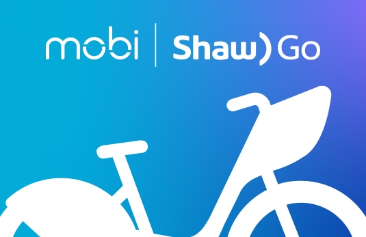 标志与蓝色背景和一个程式化的白色阴影风格的形象的一步通过自行车。图片顶部有“Mobi”和“Shaw Go”字样