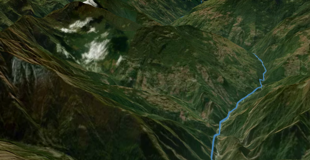 计算机生成的地形图像，绿色的山和一条蓝色的线代表一条河流。