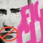 一小段用模版印制的男子涂鸦，他的嘴上有一个经过审查的符号