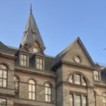 the gabled roof of City Hall, seen from Barrington Street.