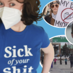 一个白人女人戴着面具，穿着蓝色T恤上面写着“讨厌你的狗屎”。