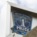 A closeup of the crest of the Halifax Regional Police outside the main entrance of their headquarters