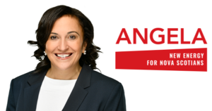 Black lady in dark blazer smiles for the camera.