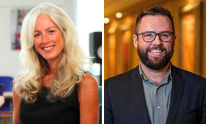 一个微笑的金发女人和一个微笑的留着黑胡子的白人男人。