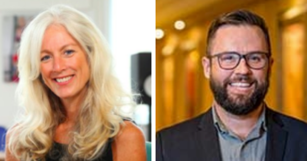 一个微笑的金发女人和一个微笑的留着黑胡子的白人男人。