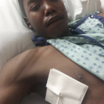 一个躺在病床上的年轻黑人