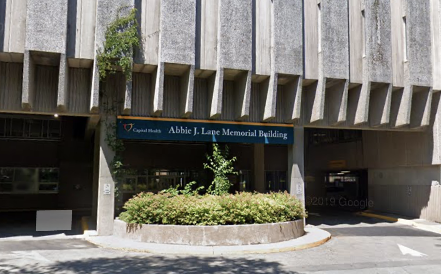 The exterior of a gray stone building with Abbie J. Lane Memorial written across the front.