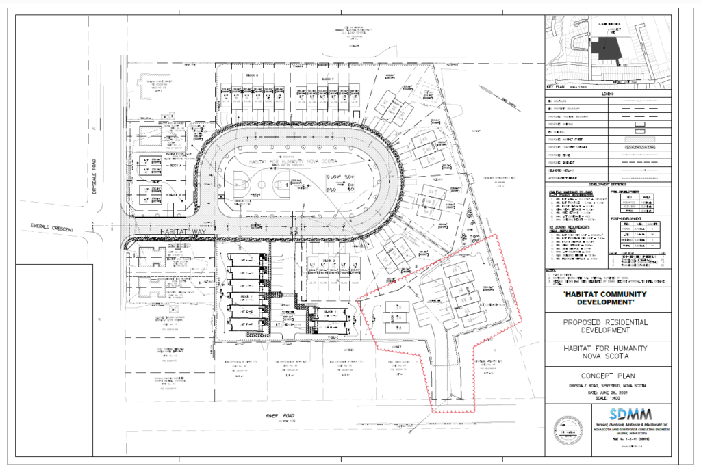 A blurry black and white diagram shows the overhead plan for a new development, consisting of townhouses.
