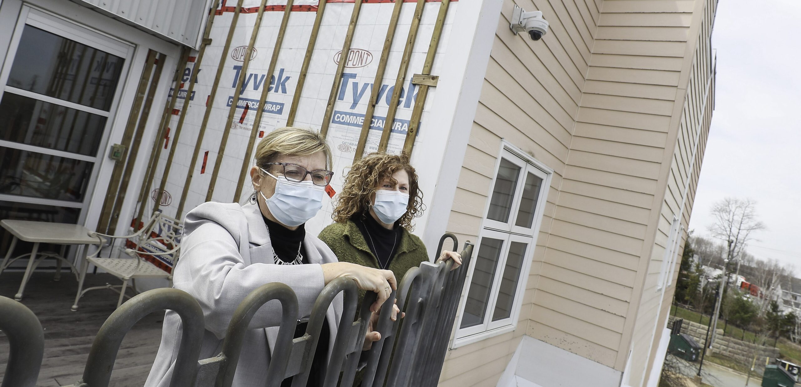 two women at a construction site