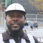 穿黑白衣服的黑人裁判条纹，戴黑白帽子