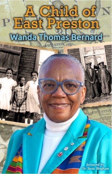 Book cover: A Child of East Preston by Wanda Thomas Bernard. The cover shows Ms. Thomas Bernard who has a short haircut, is wearing glasses, and a bright aqua jacket with pins on the lapels. The cover also includes black and white photos of young children.