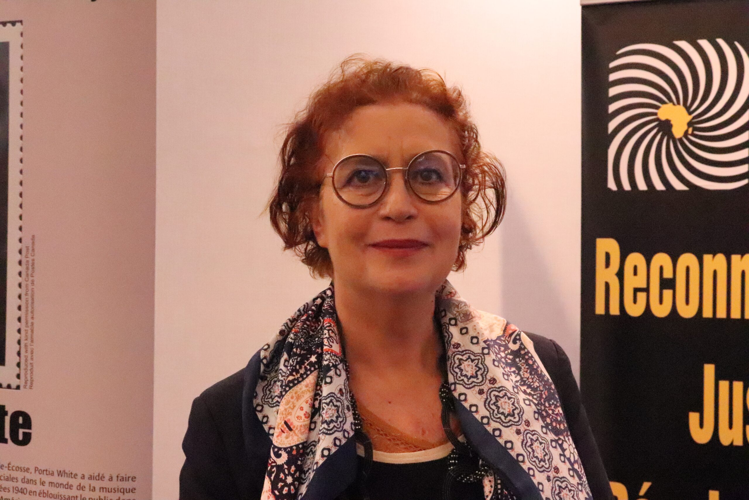 Myrian Cottias, scientific committee chair for the UNESCO Routes of Enslaved Peoples Project smiles for the camera.