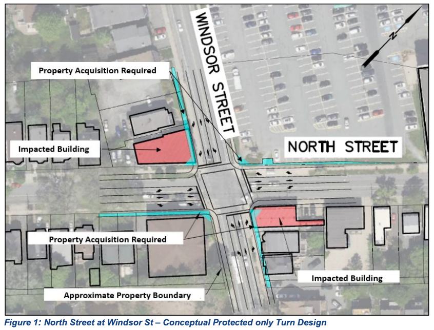 有注释的地图显示了一个十字路口。这张地图是在谷歌地球的图像上绘制的，上面画着拟议的车道，用颜色突出显示需要购买的物业和受影响的建筑物。