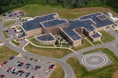 Aerial view of a hospital and helipad
